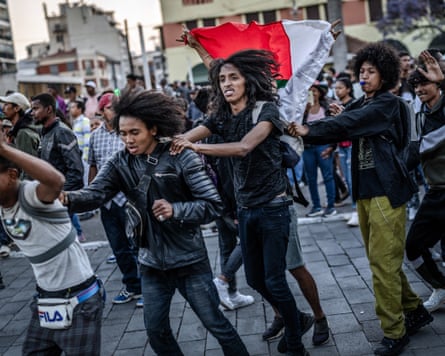 Young people dance in the streets