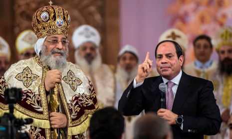 Egypt’s president, Abdel Fatah al-Sisi, at a Christmas Eve mass with the Coptic pope, Tawadros II.