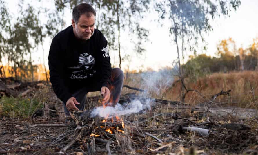 Tati Tati elder Brendan Kennedy making a camp fire