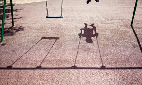 Shadow of child on a swing