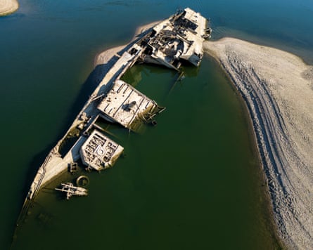 The wreckage of a German warship emerges from the Danube near Prahovo, Serbia, as drought and prolonged hot and dry weather continues.