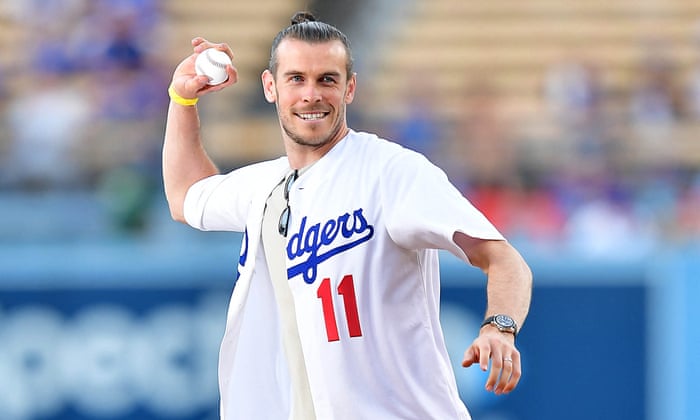 Bale in action in LA (admittedly throwing out the ceremonial first pitch before the LA Dodgers play the Minnesota Twins, but action is action).