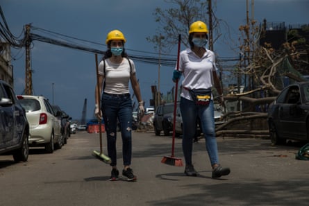 Women helping the cleanup after the explosion on August 13, 2020 in Beirut, Lebanon.