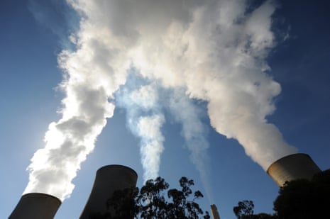 Steam from cooling towers of a coal-fired power plant