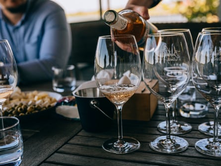 Rosé wine being poured into a glass for wine tasting at Beykush winery in Mykolaiv region