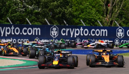 Red Bull’s Max Verstappen gets past McLaren’s Oscar Piastri on the first corner during the Emilia Romagna Grand Prix in May