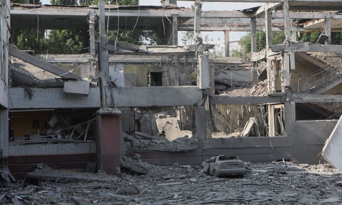 Russia-Ukraine war live news: 10 killed in strike on Donetsk apartment block; Zelenskiy dismisses ambassadors | Ukraine 5 A school building heavily damaged by a Russian military strike in Kharkiv, Ukraine. REUTERS/Vyacheslav Madiyevskyy.