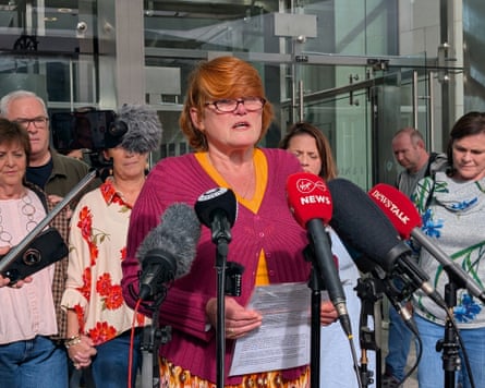 Orla Poole speaks into microphones outside the court
