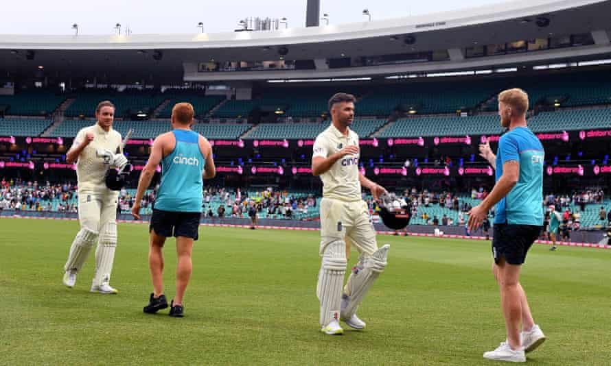 Stuart Broad and Jimmy Anderson are congratulated by Jonny Bairstow and Ben Stokes as they leave the field