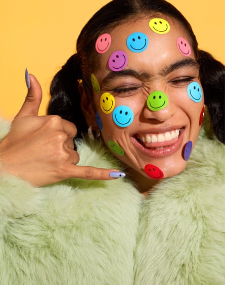‘A spontaeous call is more warm and heartening than a text message.’ Photograph of a young woman with holding her hand - which is the shape of a phone - up to her ear