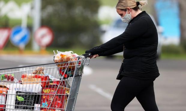 A woman shops at a Pak’nSave supermarket in Auckland. Shoppers in New Zealand face some of the most expensive groceries in the OECD. 