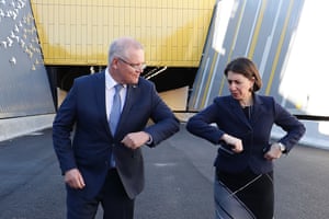 Prime minister Scott Morrison and NSW premier Gladys Berejiklian bump elbows in June.