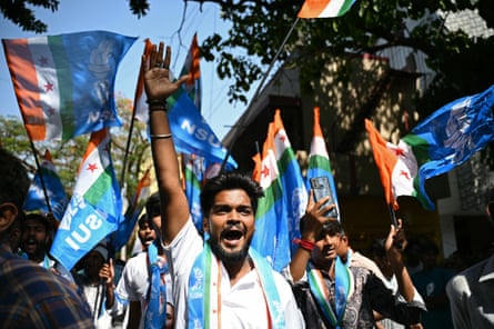Campaigners march and wave flags
