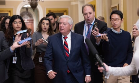 Republican senator Lindsey Graham is followed by reporters