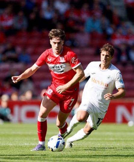 Middlesbrough’s Hayden Hackney (left) and Swansea City’s Goncalo Franco battle for the ball