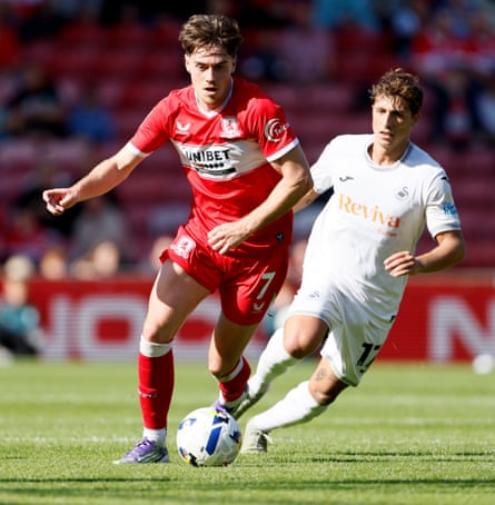 Middlesbrough’s Hayden Hackney (left) and Swansea City’s Goncalo Franco battle for the ball