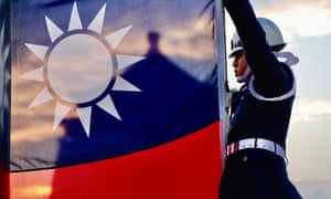 Guards raise Taiwan’s national flag in Taipei. The US and Taiwan have agreed to a five-year deal pledging cooperation in health, technology and security.