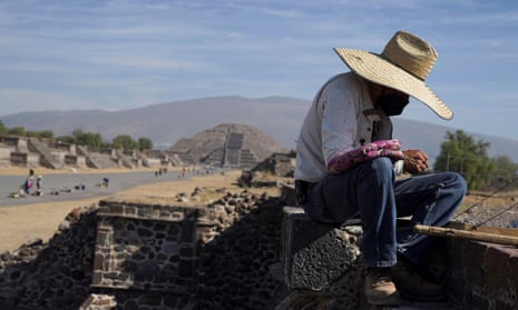 A vendor arranges his merchandise during the gradual reopening of the ancient Teotihuacan pyramids to public, as the coronavirus outbreak continues, in San Juan, Teotihuacan, Mexico.