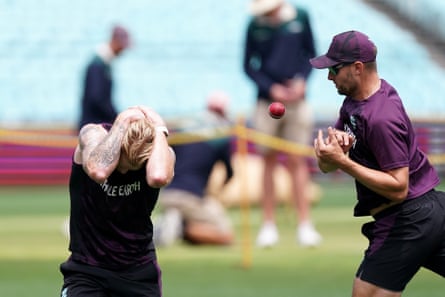 Ben Stokes (left) protects his head as Will Jacks drops a catch during England’s training session at the Sydney Cricket Ground.