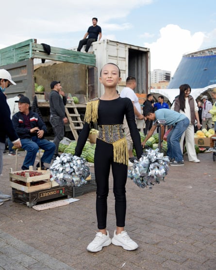 A member of the Esquire cheerleading team from Cheer Kazakhstan, photographed in a food market in capital city Astana