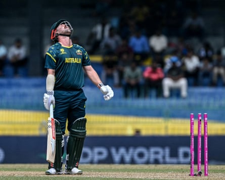 Travis Head reacts after being bowled by Zimbabwe’s Brad Evans.