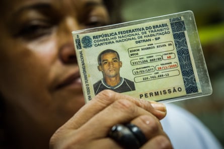 a women holding a card