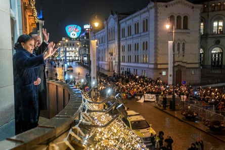 Abiy and his wife, Zinash Tayachew, wave to the crowd in Oslo after he received the Nobel peace prize in 2019.