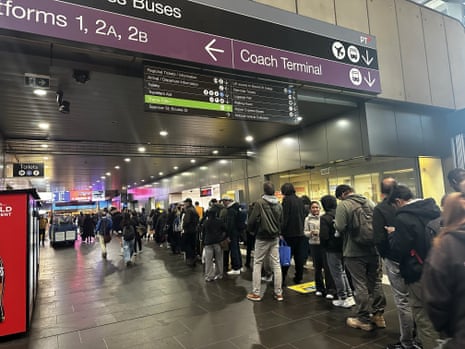Commuters queueing at Southern Cross station in Melbourne after delays to V/Line services caused by the Telstra outage on 8 July 2026