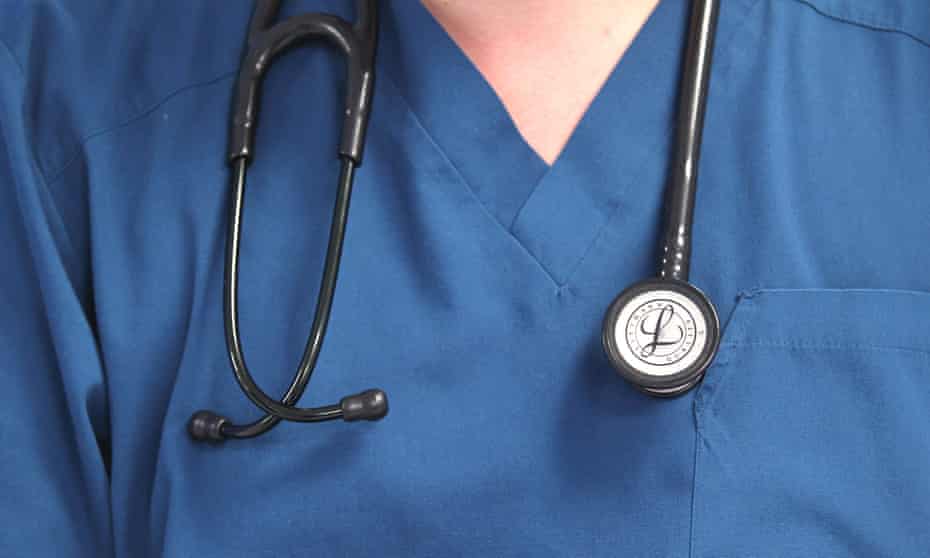 Stethoscope hanging on a doctor's chest
