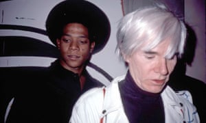 Basquiat with Andy Warhol at the opening of their show at the Tony Shafrazi Gallery, New York, in the mid 80s. Photograph: Everett Collection Inc/Alamy S