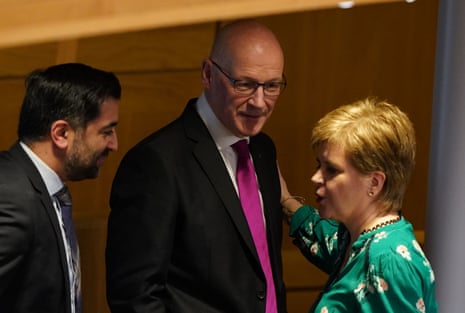 John Swinney in the Scottish parliament today with his two predecessors, Humza Yousaf and Nicola Sturgeon.
