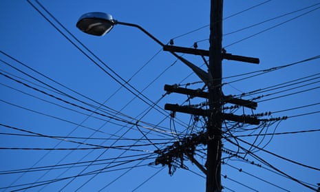 Silhouette of power poles
