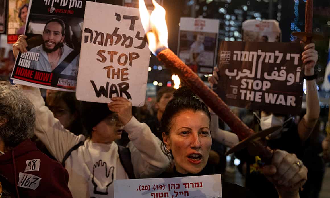 Protesters calling for the return of hostages held in the Gaza Strip react after a Gaza ceasefire and hostage release deal was reached.