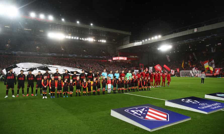 The two teams line up in a crowded Anfield on March 11, 2020.