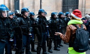 A student protests in Paris against changes in education policy