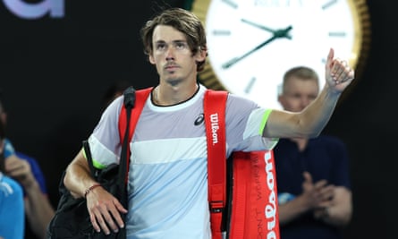 Alex de Minaur waves to the crowd after his loss