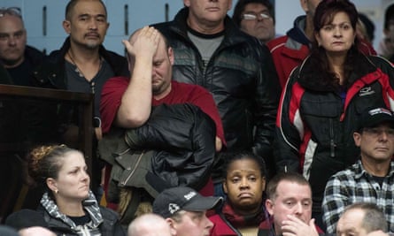 Reactions at a union meeting in Oshawa, Ontario, one of the regions also affected by the layoffs.