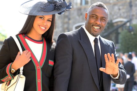 Idris Elba and Sabrina Dhowre arrive at St George’s Chapel.