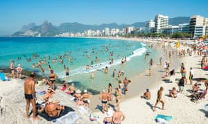 Beachgoers at the Arpoador end of Ipanema Beach