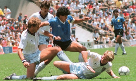 Diego Maradona takes on the England defence during Argentina’s 2-1 win in the 1986 World Cup quarter-finals