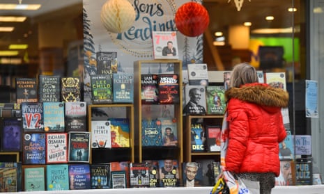 A woman looks through the shop window of Waterstones in Crewe during the November lockdown.