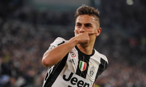 Paulo Dybala celebrates scoring the first goal in the Champions League quarter-final game against Barcelona in Turin.