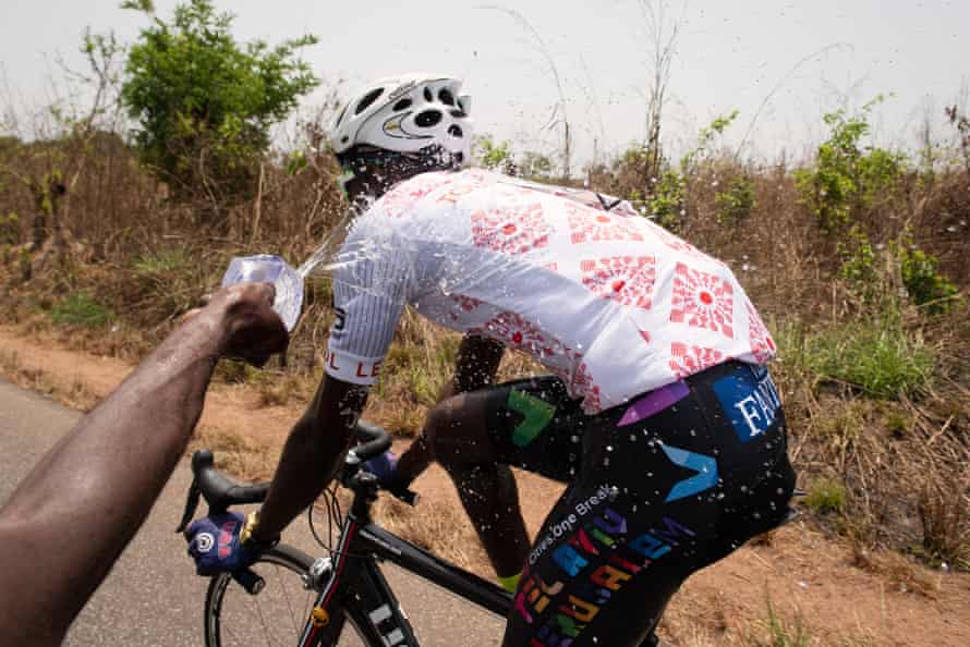 Ibrahim Jalloh of Lunsar Cycling Team A cools down in searing temperatures.
