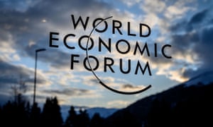 A sign for the World Economic Forum (WEF) is seen at sunset in the Congress centre ahead of the annual meeting in Davos.