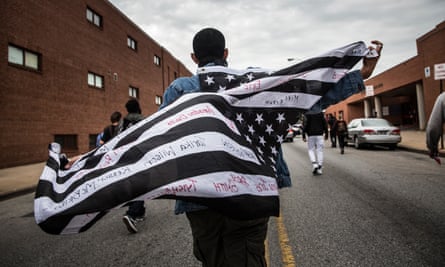 Protesters march through the streets in support of Maryland state attorney Marilyn Mosby’s announcement that charges would be filed against Baltimore police officers in the death of Freddie Gray on May 1, 2015 in Baltimore, Maryland. Gray died in police custody after being arrested on April 12, 2015.