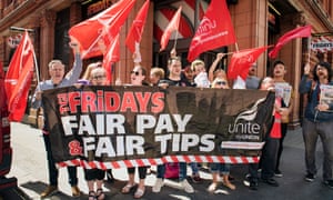 tgi fridays staff go on strike in uk s first dispute over tipping