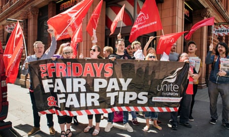 Staff from TGI Fridays demonstrate in Covent Garden, central London