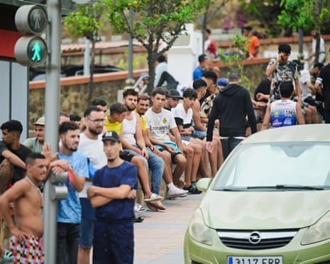 Migrants gather in downtown Ceuta, Spain.