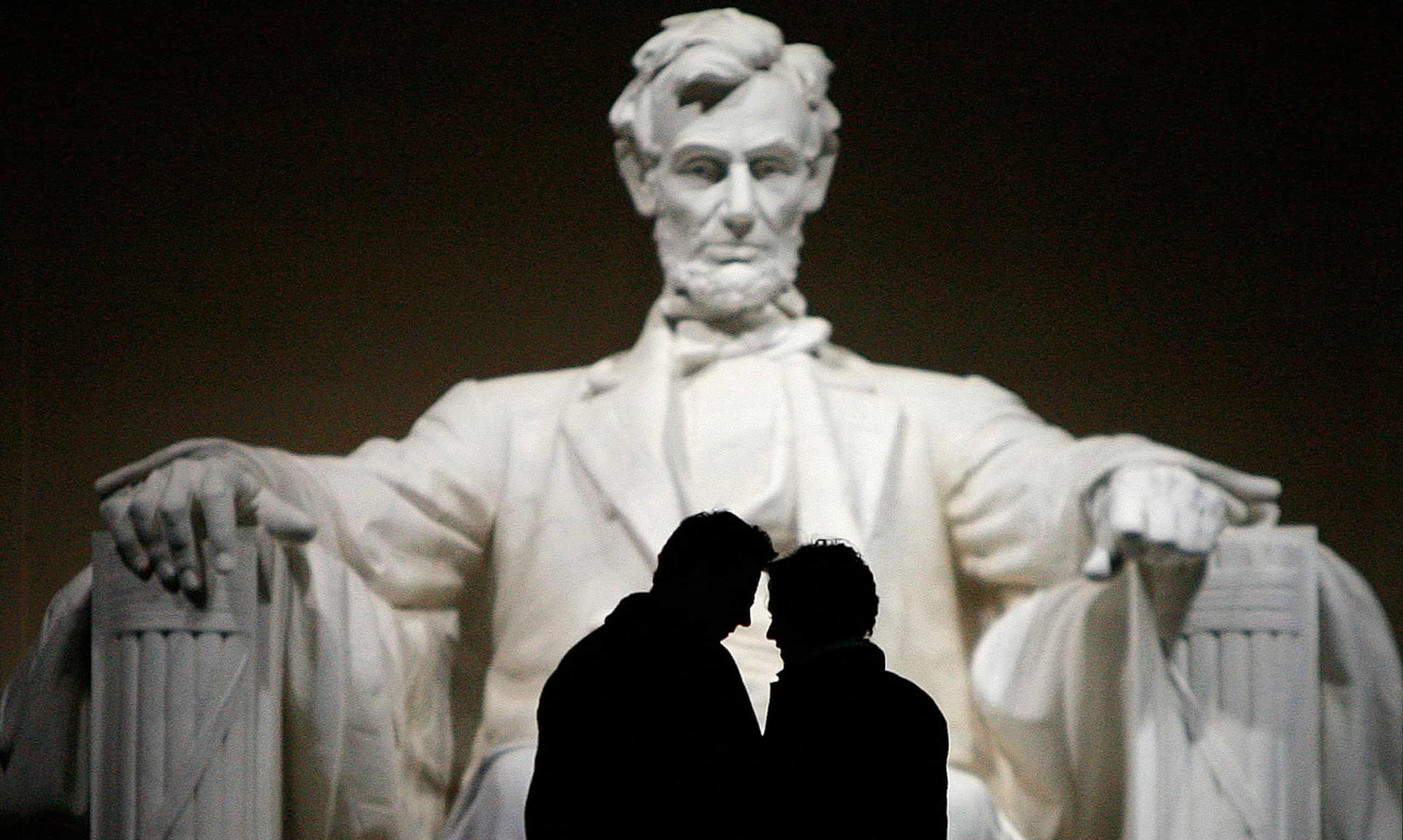 A couple shares a moment during a visit to the Lincoln Memorial in Washington.