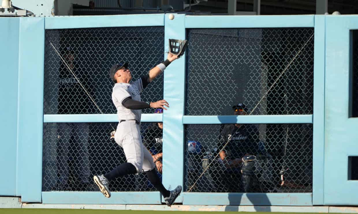 Aaron Judge crashes through door to make potential MLB catch of the year (theguardian.com)